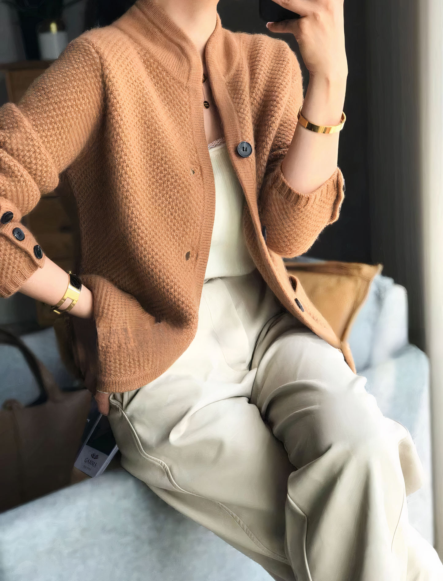 Ivory slim-fit women's cashmere cardigan with elegant button closure for timeless warmth