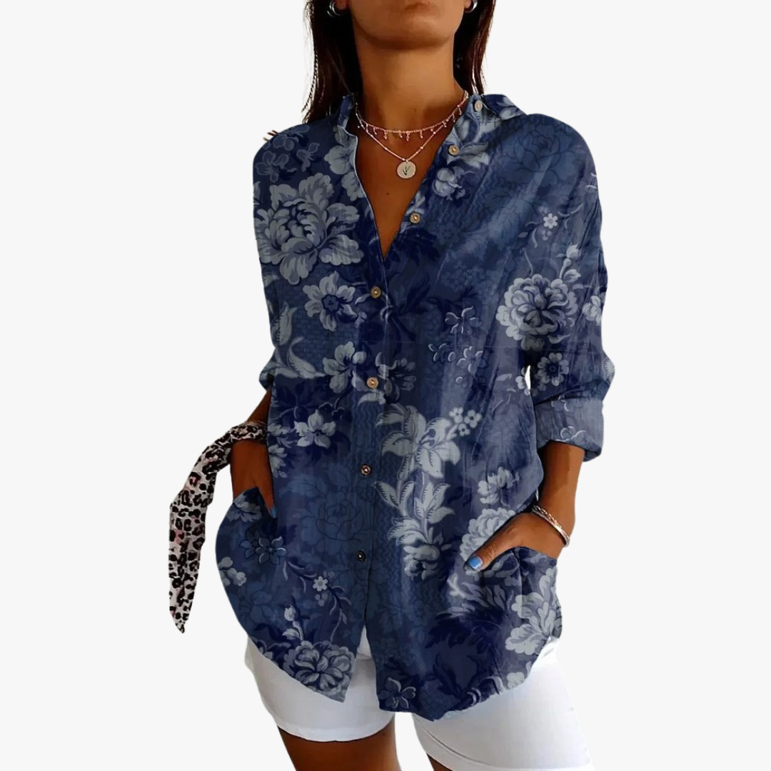 Women's white linen blouse with handcrafted embroidery, relaxed elegant fit for timeless artisanal style