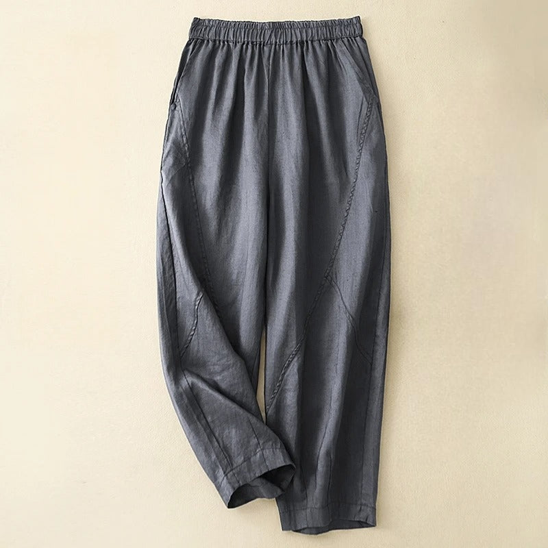 Madina beige tapered linen-blend pants with elastic waist and artful seam panel detailing