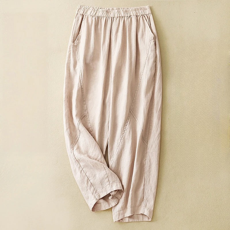 Madina beige tapered linen-blend pants with elastic waist and artful seam panel detailing