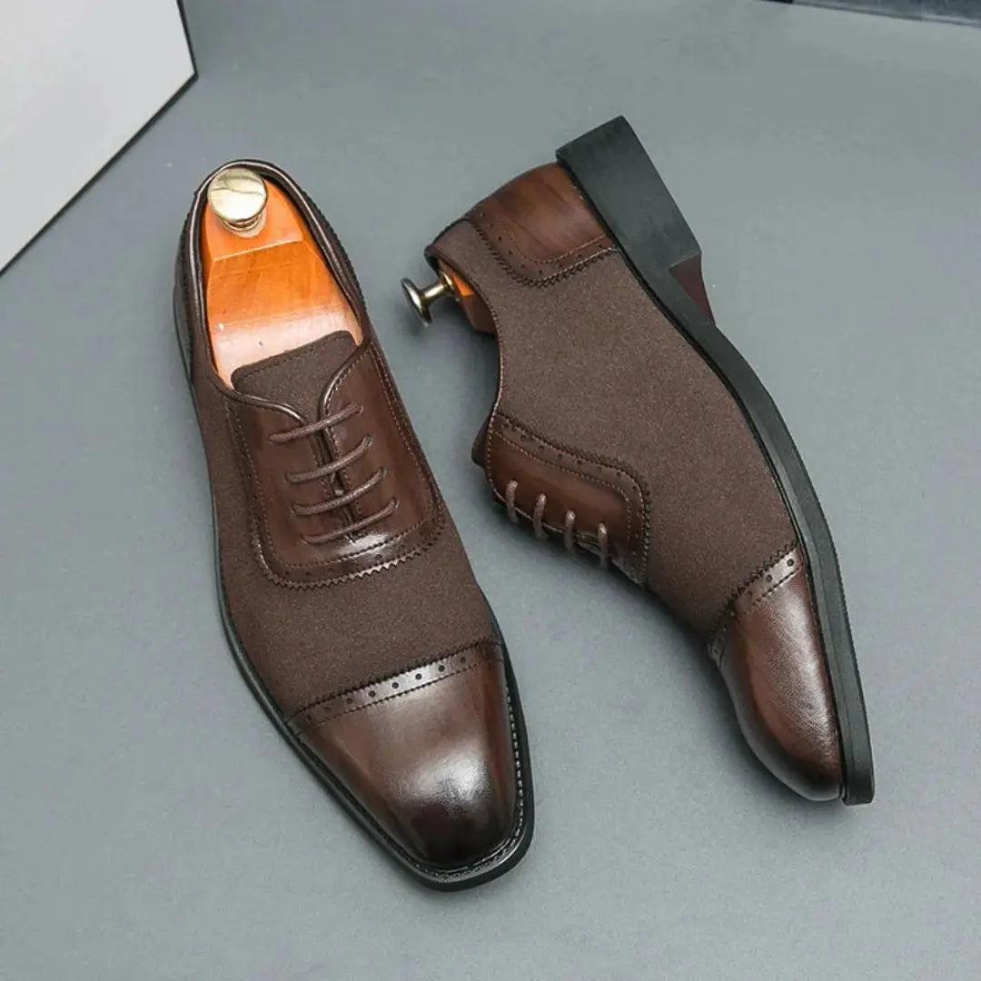 Black Oxford dress shoes with black-on-black lace contrast and slip-resistant sole for professionals