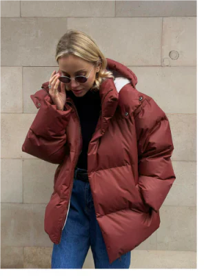 Women's oversized hooded down jacket warm lining cozy winter puffer with contemporary silhouette
