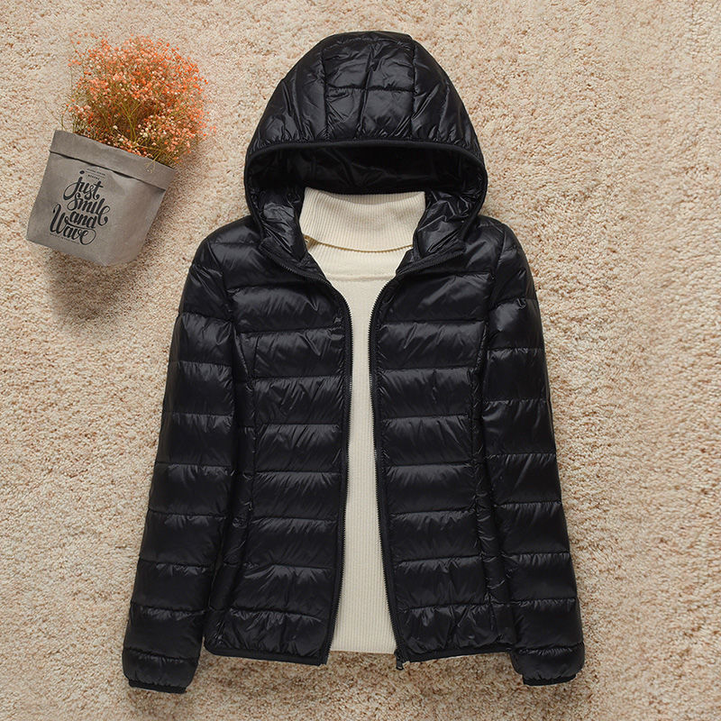 Women's hooded puffer jacket lightweight warm cozy style outdoor adventure cold weather essential