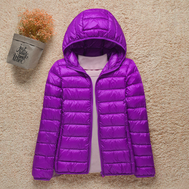 Women's hooded puffer jacket lightweight warm cozy stylish outdoor cold-weather attached hood