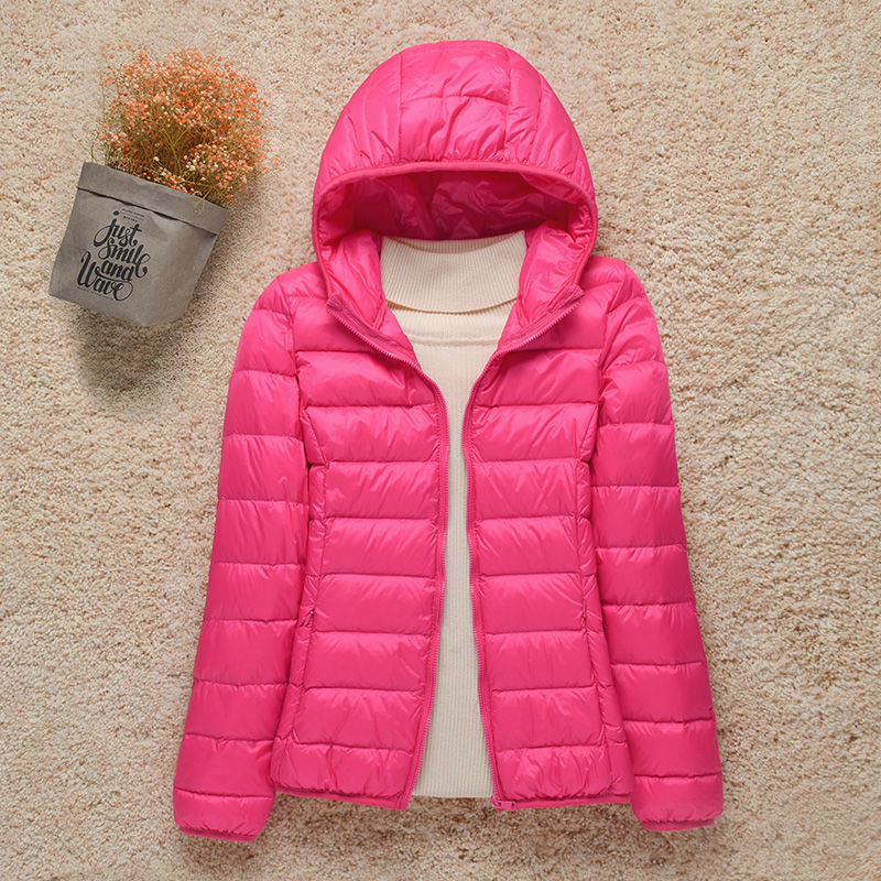 Women's hooded puffer jacket lightweight warm cozy stylish outdoor adventure cold weather layer
