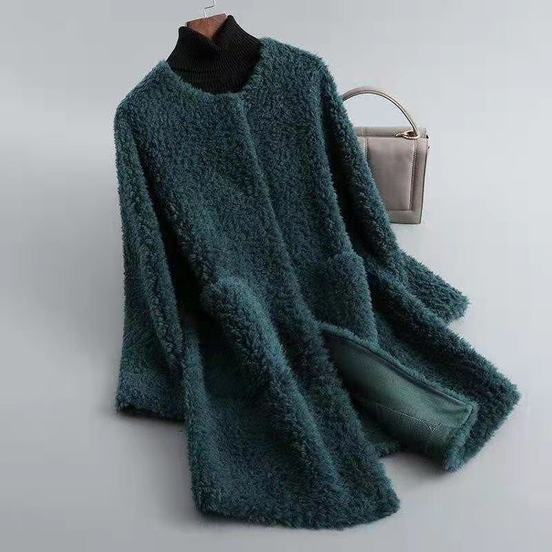 Women's oversized shaggy wool knee-length coat in neutral tone with open front relaxed silhouette
