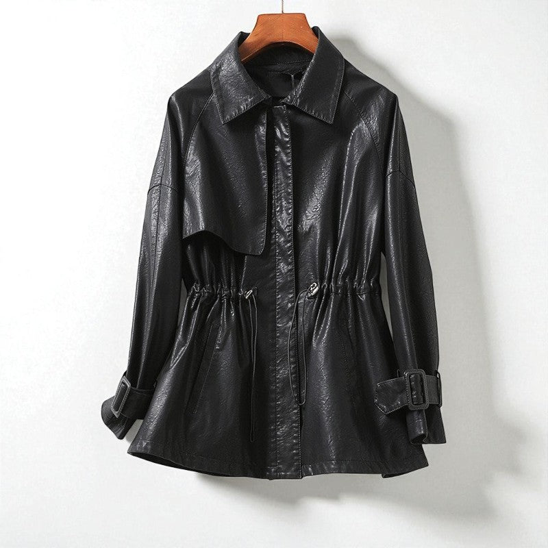 Bold glossy sheepskin leather rider jacket with cinched waist and belted cuffs