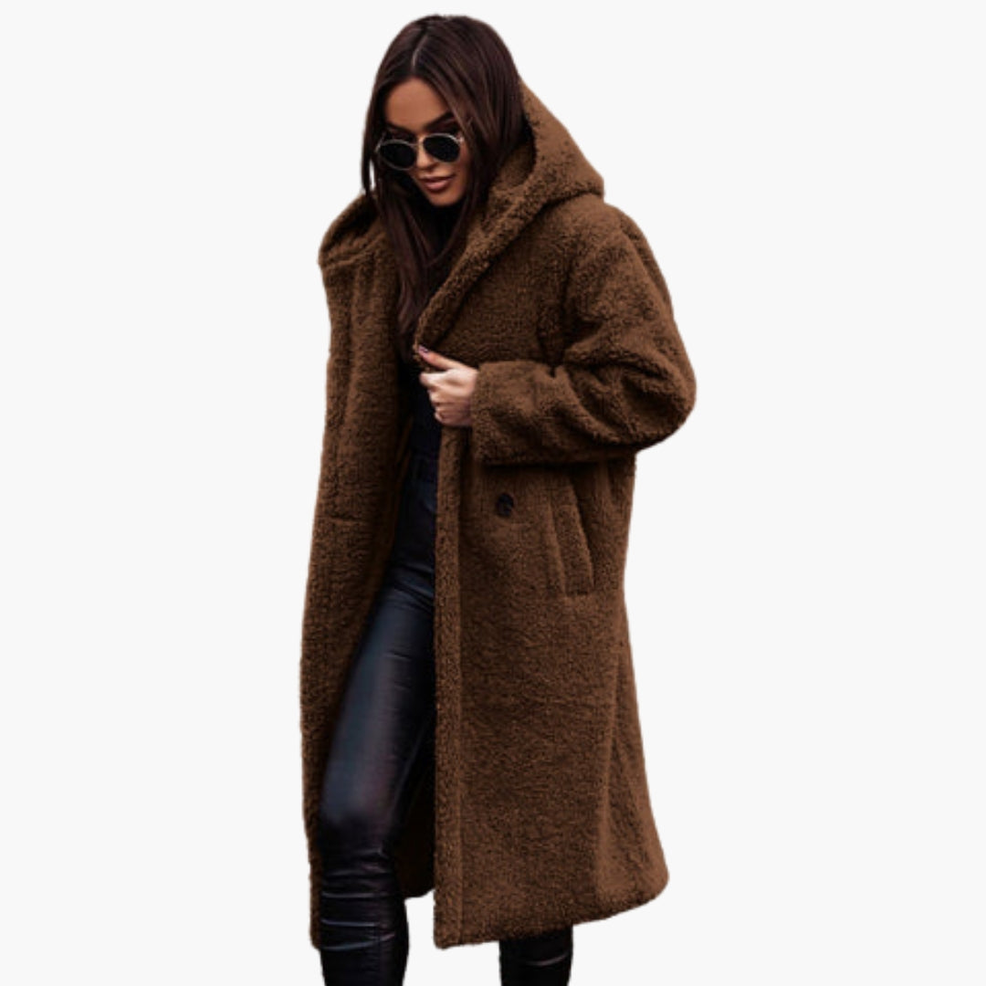 Women's long teddy coat with hood, plush texture, button closure, and front pockets for cozy warmth
