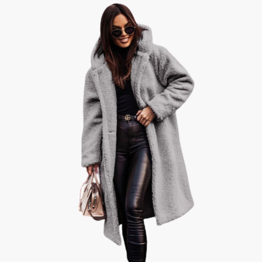 Women's long teddy coat with hood, plush texture, button closure, cozy warmth for cool days