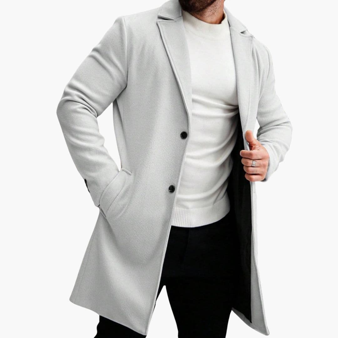 Men's classic long coat with notched collar, vertical button closure, and side pockets in a clean silhouette