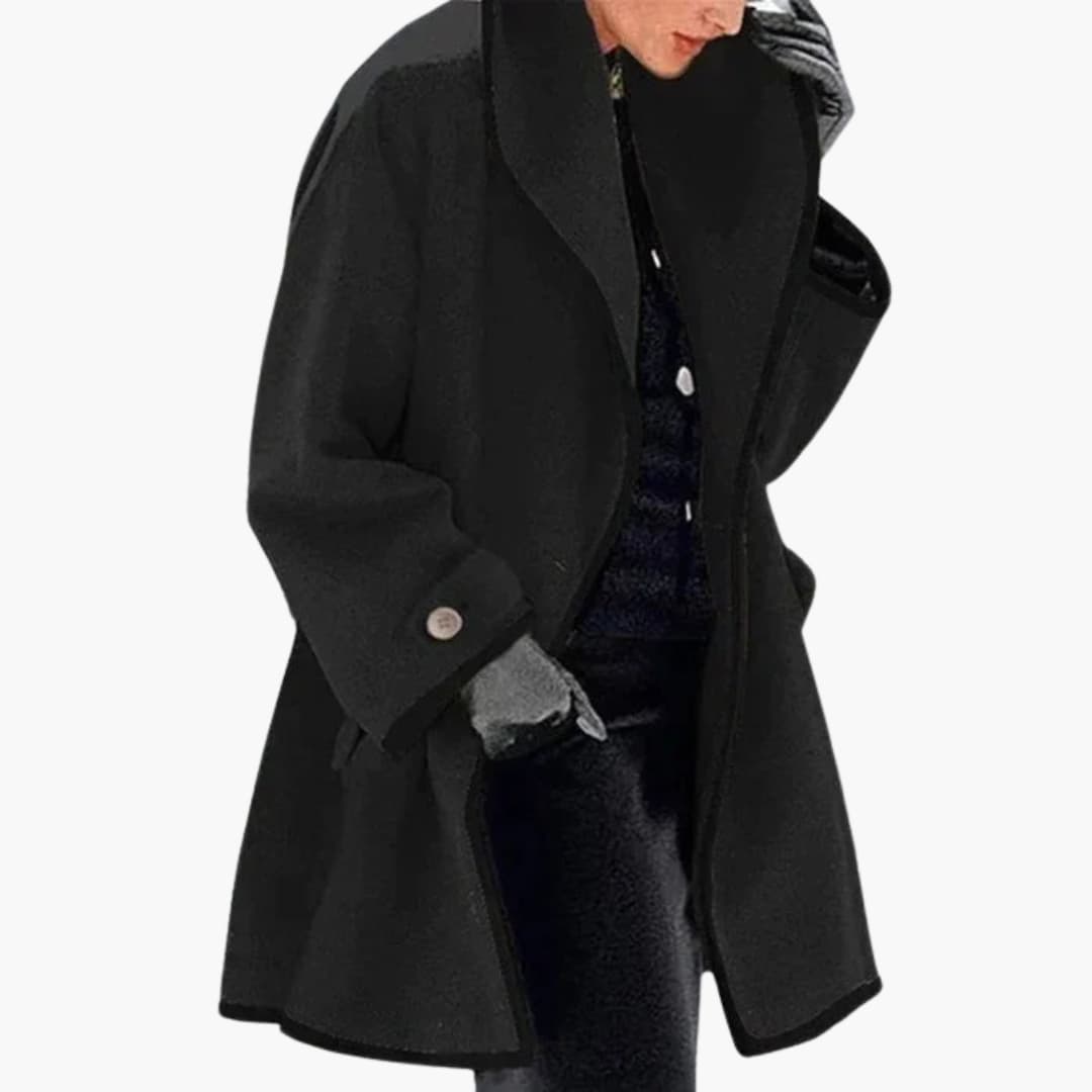 Women's longline hooded coat with button closure, front pockets, below-hip cozy outerwear