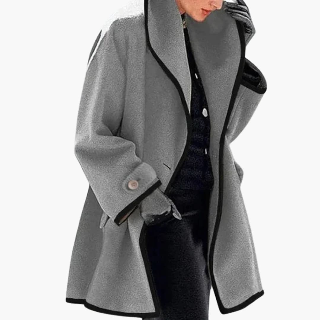 Women's longline hooded coat with button closure, front pockets, cozy below-hip silhouette