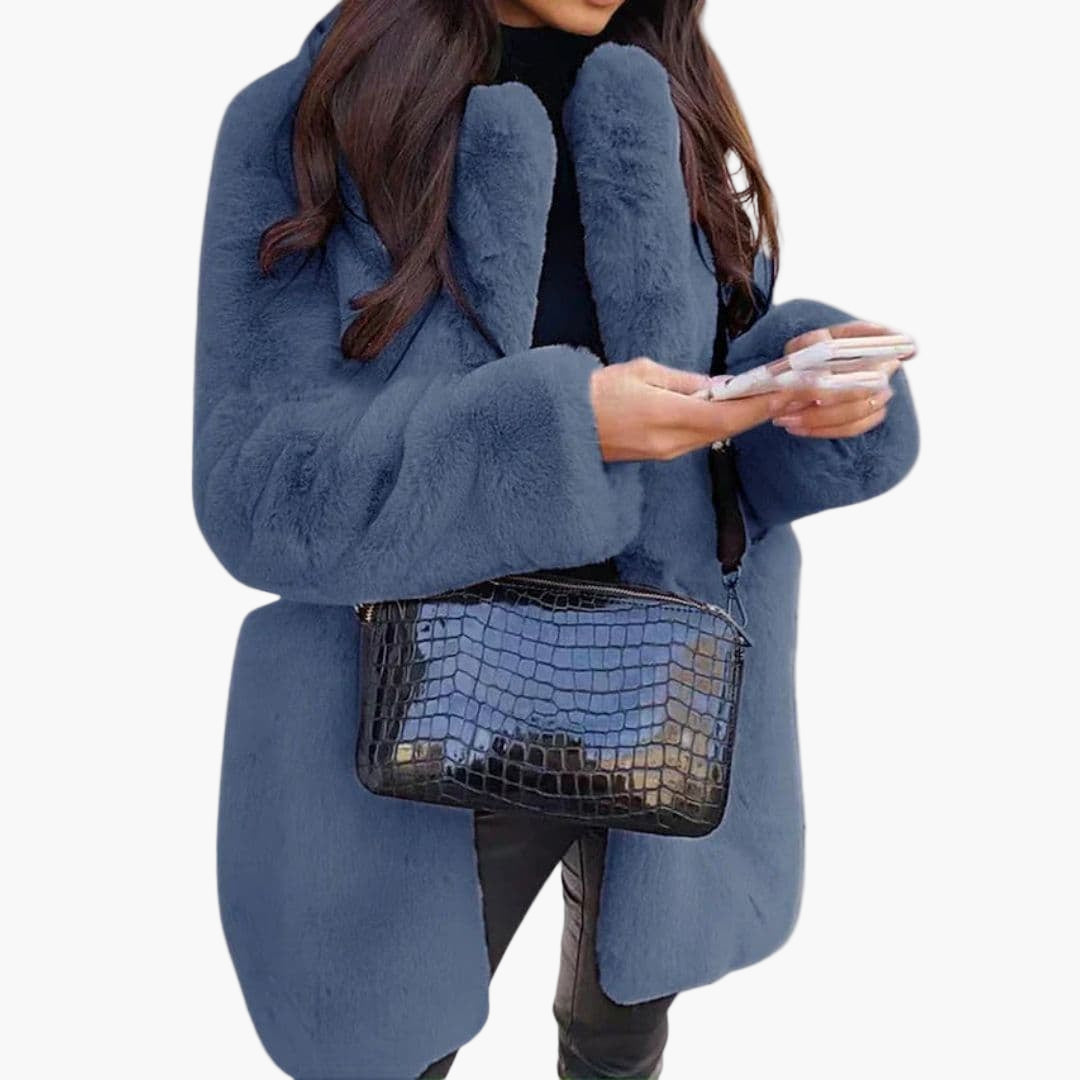 Women's mid-length plush coat with textured surface, structured silhouette, and discreet hook closure