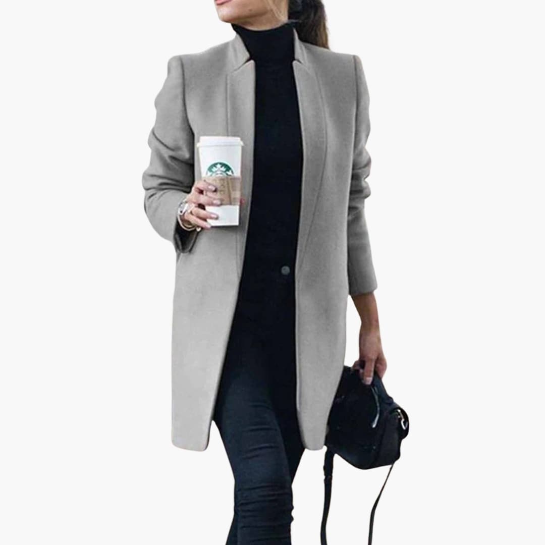 Women's slim fit mid-thigh long coat with front opening, ideal for layered midseason styling