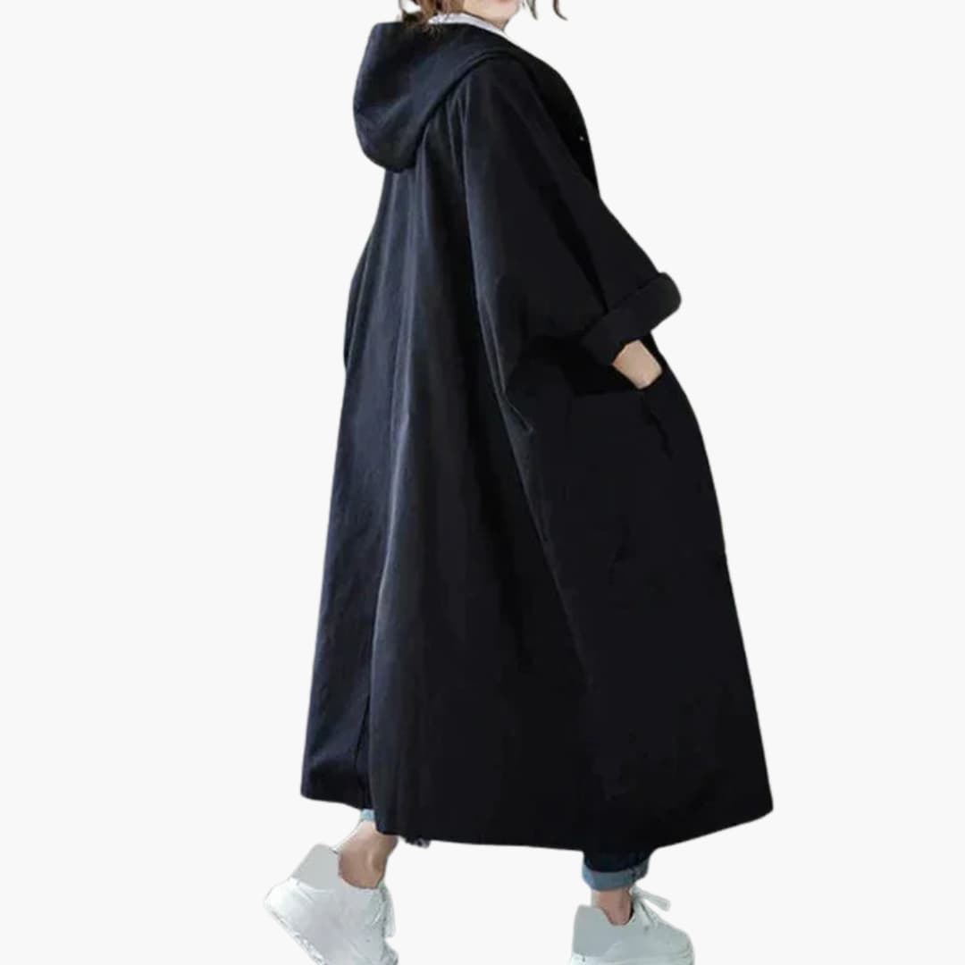 Women's knee-length hooded coat with front pockets, straight silhouette, smooth woven finish