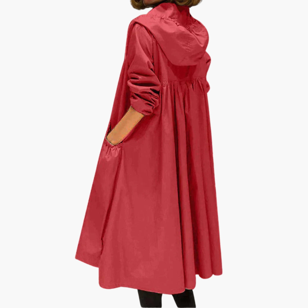 Women's hooded calf-length coat with zip closure, gathered waist, and front pockets in versatile style