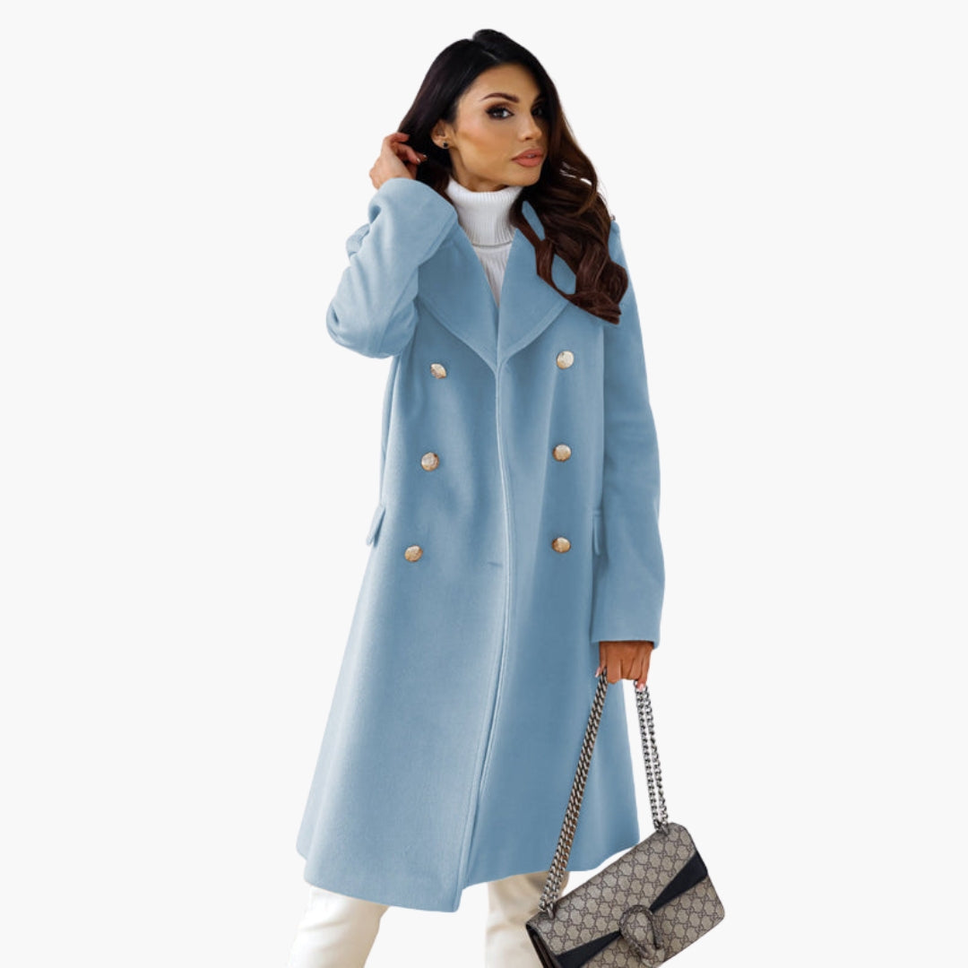 Elegant women's long crossed-front coat in neutral tone with golden button details and wide lapel