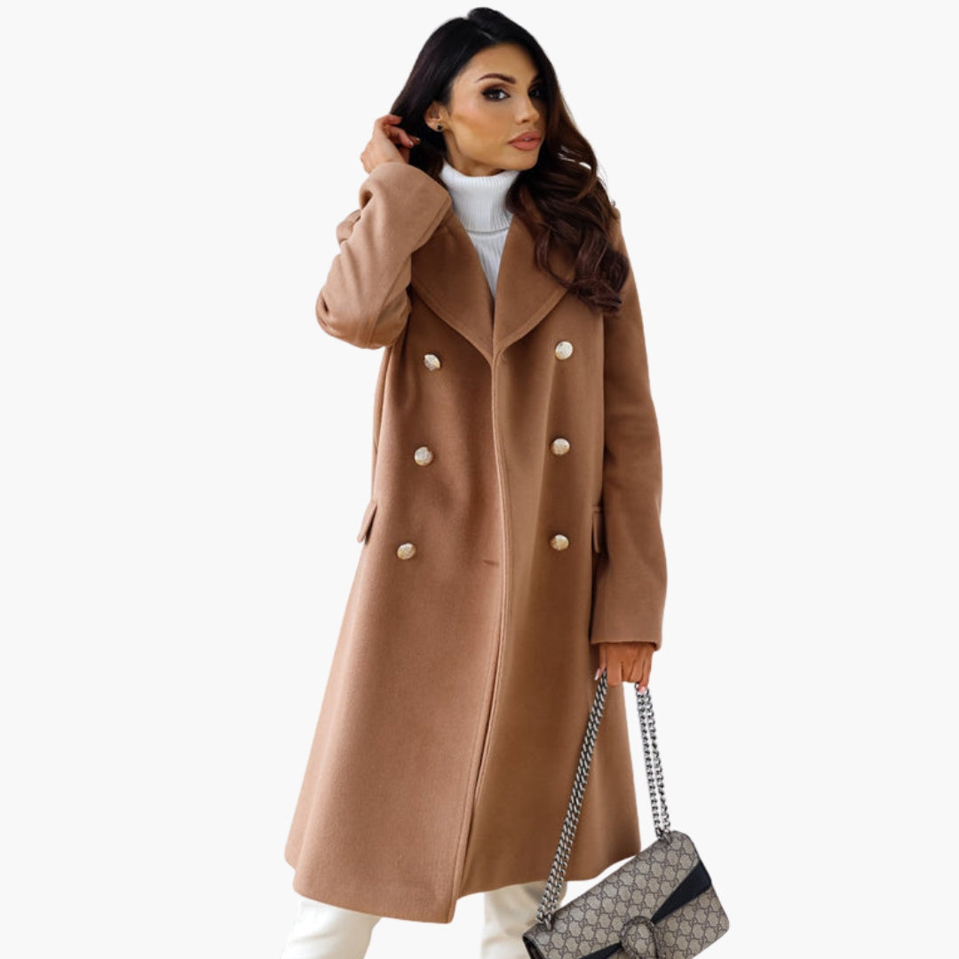 Elegant women's long crossover coat in neutral tone with wide lapel and golden button details