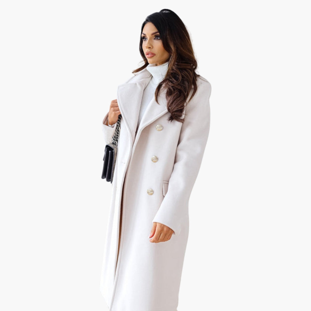 Elegant women's long crossed-front coat in neutral tone with gold button details and wide lapel collar