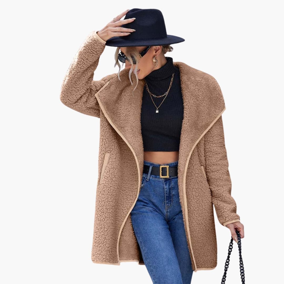 Women's long winter coat in elegant cut with notched collar, pockets, and polished full-length silhouette