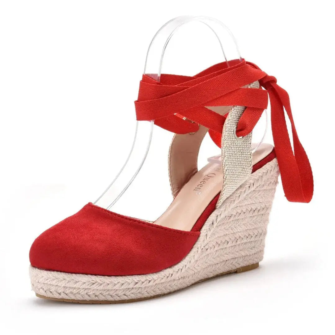 Women's closed-toe wedge espadrilles with crisscross lace-up ankle straps and rope-wrapped platform