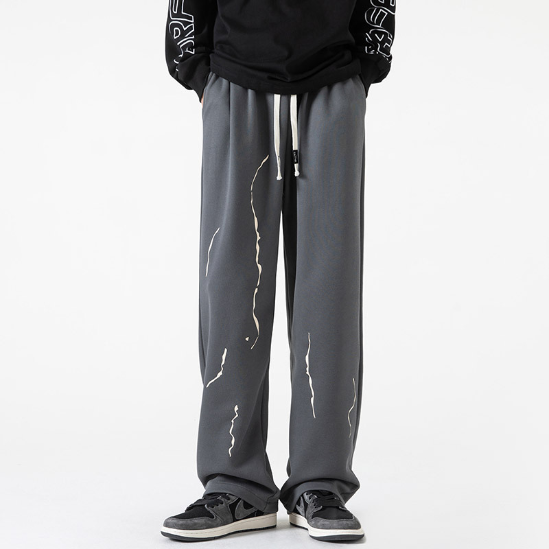 Marcello black streetwear joggers relaxed fit abstract paint-drip print avant-garde casual pants