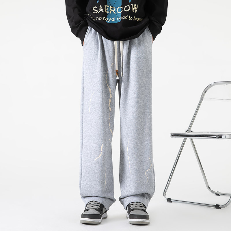 Marcello black joggers relaxed fit streetwear abstract paint-drip print breathable avant-garde style