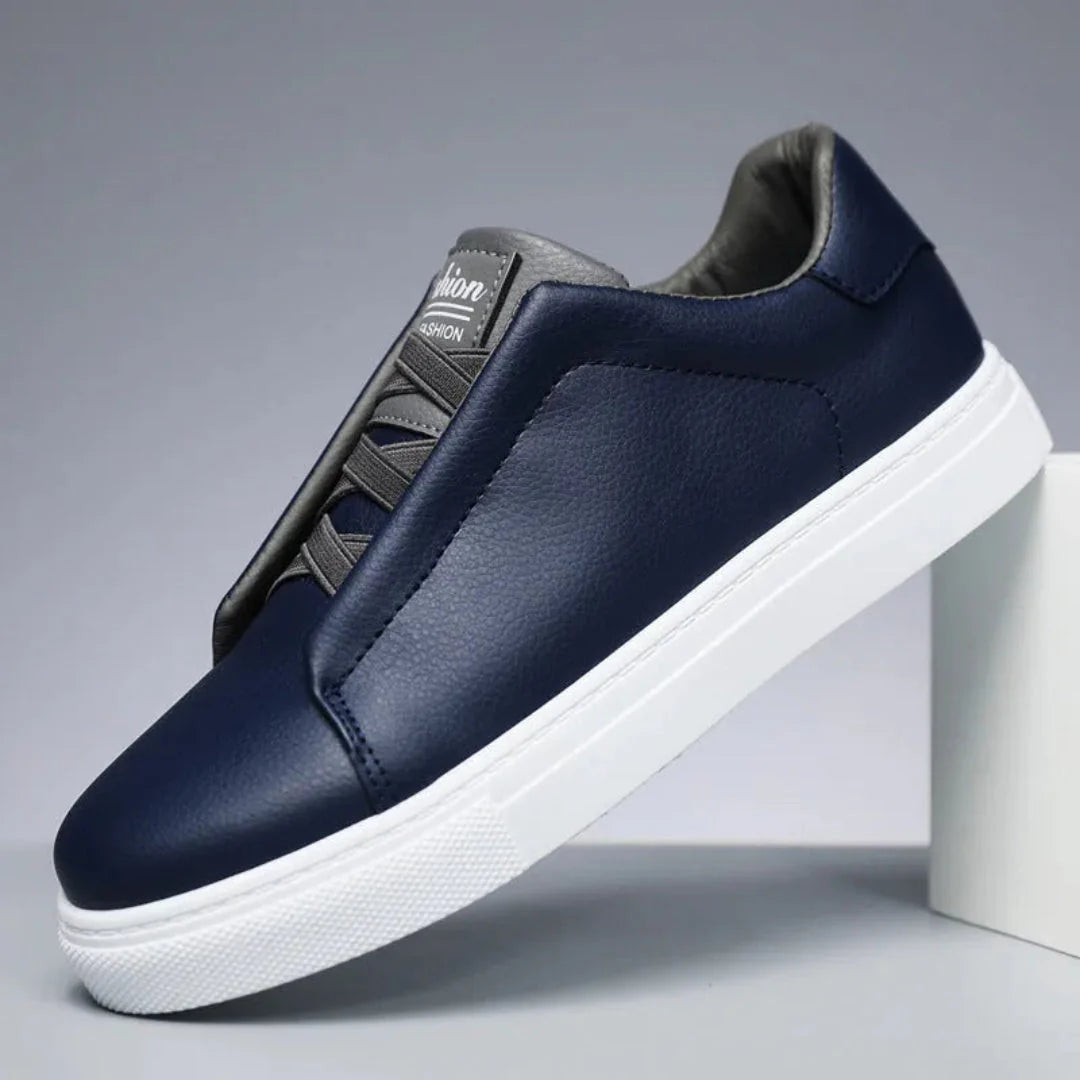 Men's white minimalist leather sneakers Marco Luxe with cushioned collar and sleek low-profile silhouette