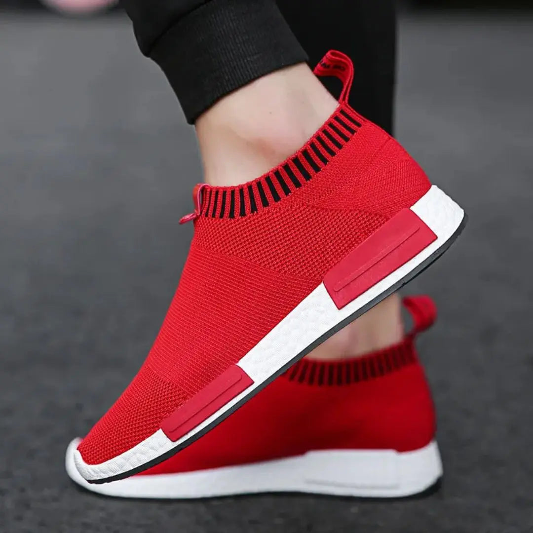 Gray slip-on knit sneakers with ultra-cushioned shock-absorbing sole for city living