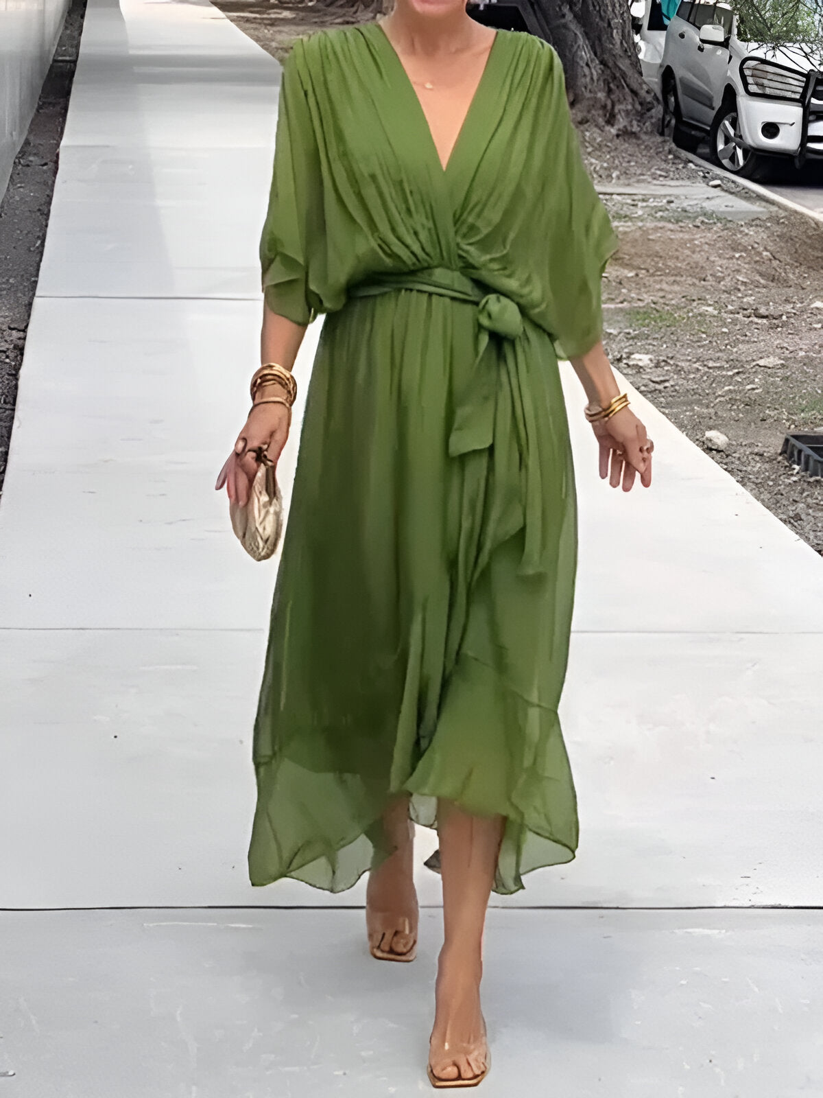 Gabriella flowy midi dress deep-V neckline cinched belt elegant day-to-night silhouette