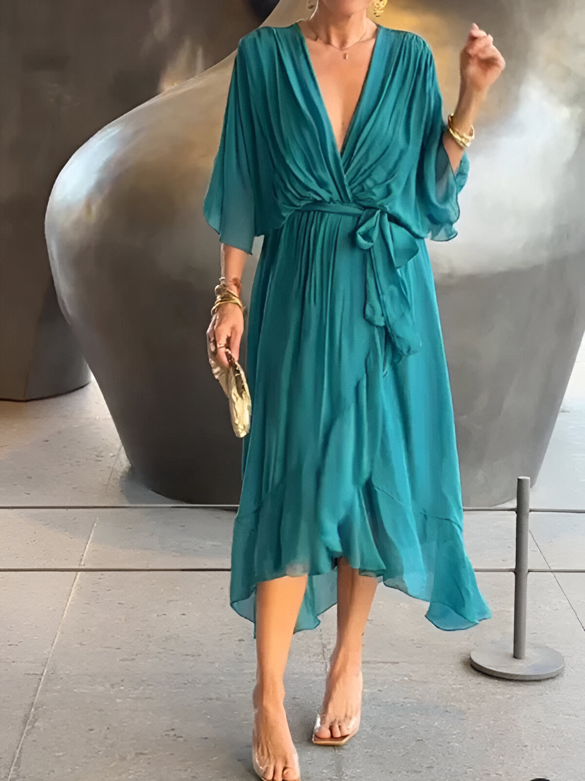 Gabriella flowy midi dress deep-V neckline cinched waist belt elegant day-to-night silhouette