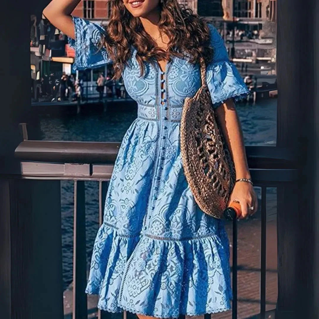 Ivory lace midi dress with V-neck, floral embroidery, cinched waist, and scalloped hem for summer