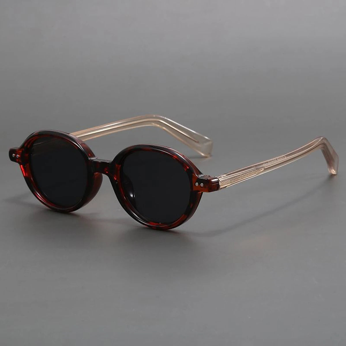 Amber brown acetate retro round sunglasses with gradient UV-protection lenses, vintage-inspired style