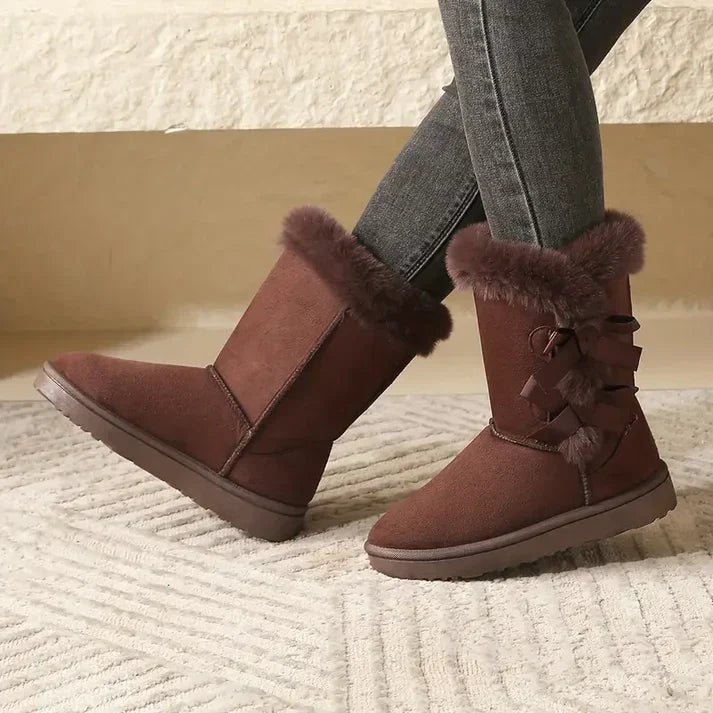 Women's mid-calf snow boots classic winter style warm sustainable easy care comfortable fit