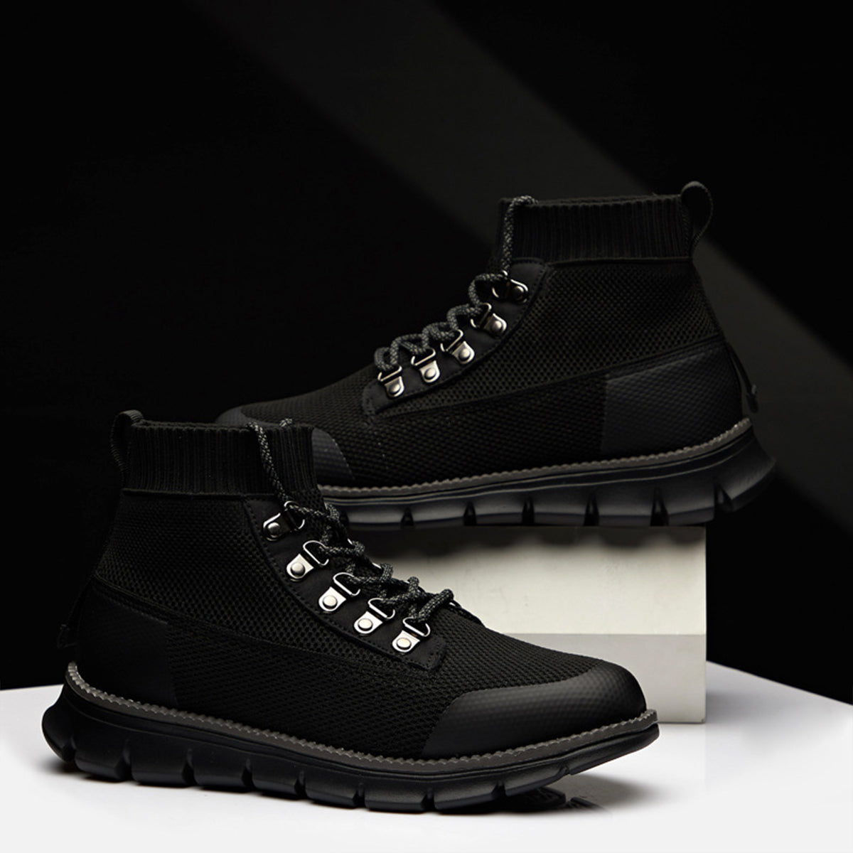 Men's brown ankle lace-up boots with ribbed cuff, rugged lug sole, and standard everyday casual fit