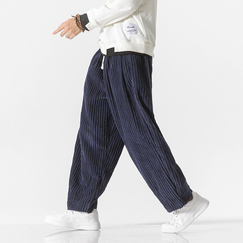 Men's olive relaxed fit pants with elastic waist and functional drawstring for casual all-day comfort