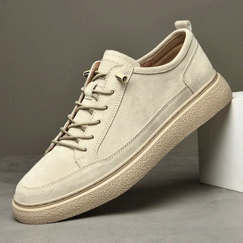 Men's genuine suede low-top sneakers in neutral tone with tonal stitching and durable rubber outsole