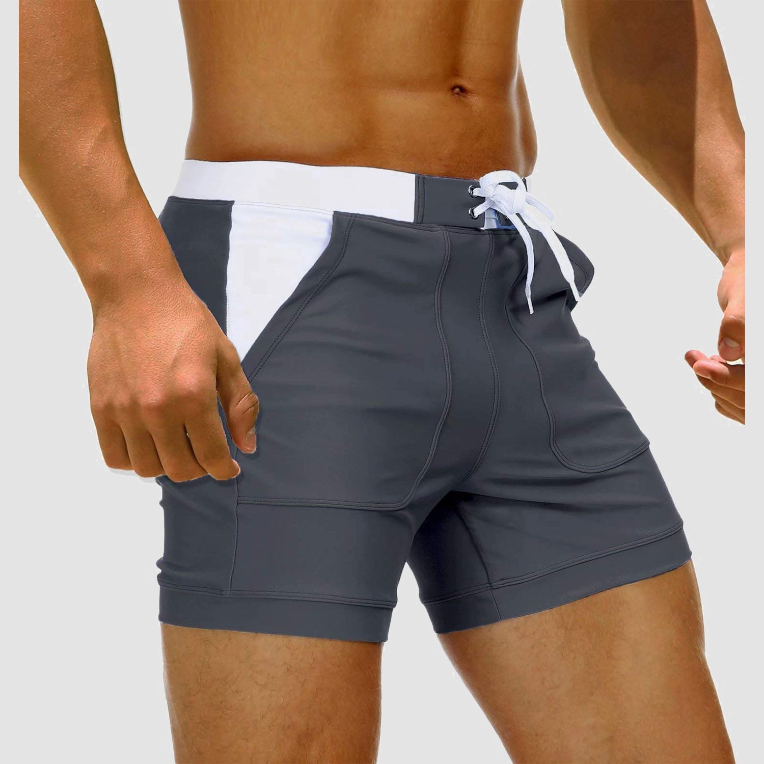 Men's quick-dry nylon spandex swim trunks with two pockets, drawcord waist, mesh lining
