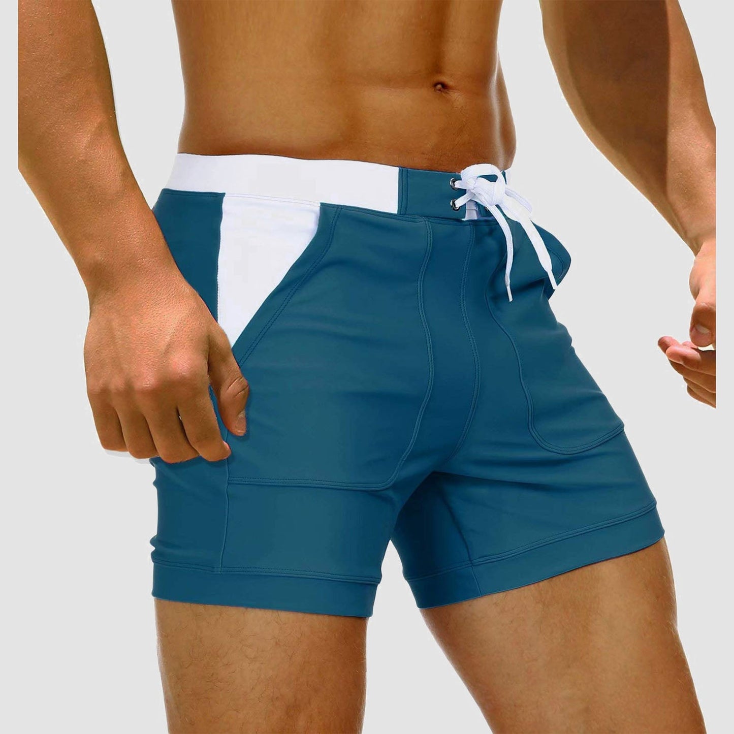 Men's quick-dry nylon spandex swim trunks with two pockets, mesh lining, and drawcord waist