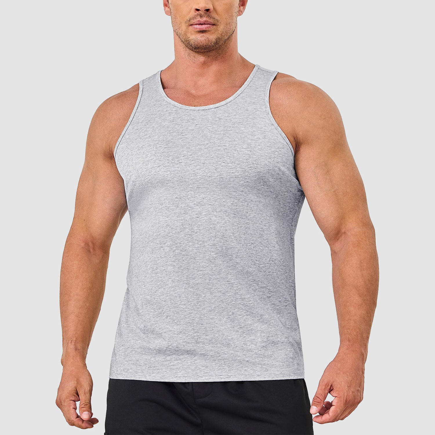 Men's lightweight cotton sleeveless muscle tank top in solid color, moisture-wicking athletic fit