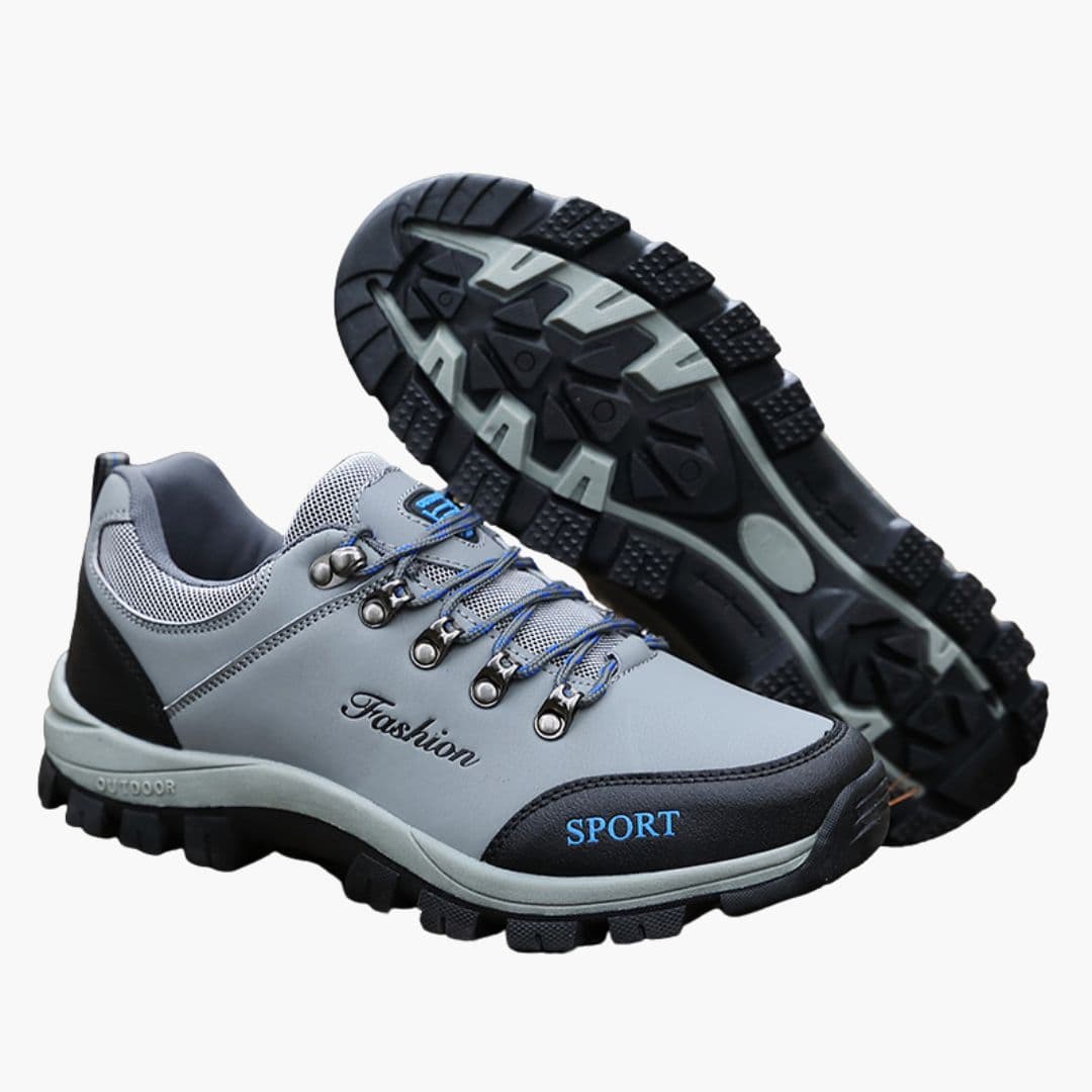 Men's lace-up hiking shoes with padded collar, textured outsole, and synthetic upper for trail support