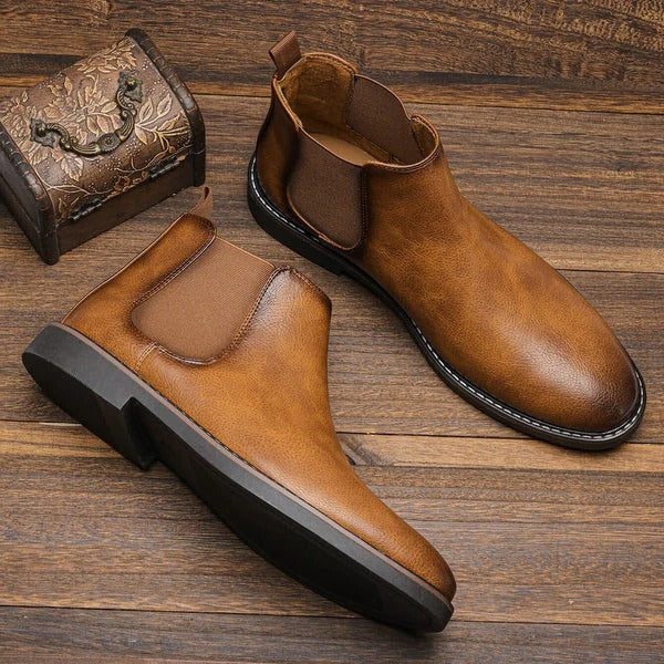 Men's brown leather Chelsea boots structured silhouette elastic side panels versatile work style