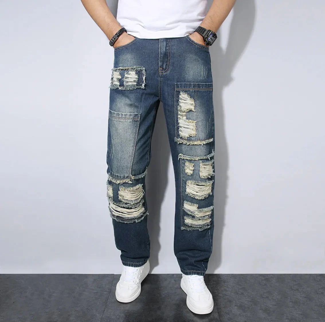 Men's loose-fit distressed jeans heavy-washed denim with ripped details urban streetwear style