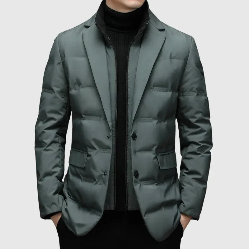 Men's navy quilted down blazer jacket with notched lapels and dual-button closure for smart-casual warmth