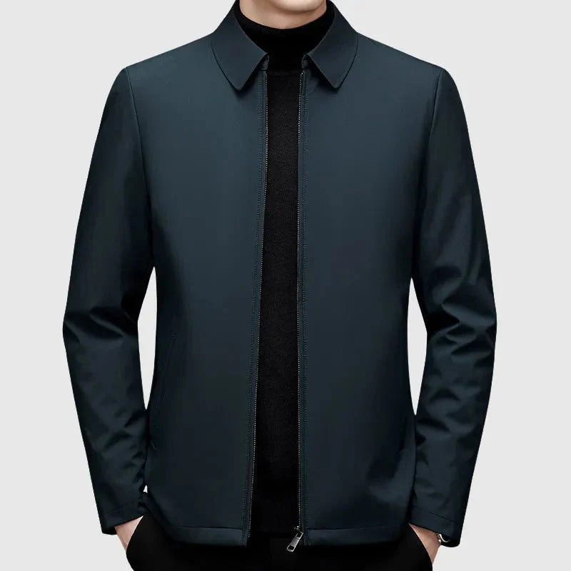 Men's navy slim-fit down jacket with turn-down collar and full zip for smart casual layering