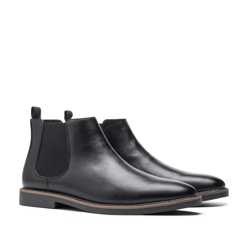Black men's Chelsea ankle boots slip-on design with sleek silhouette and elastic side panels