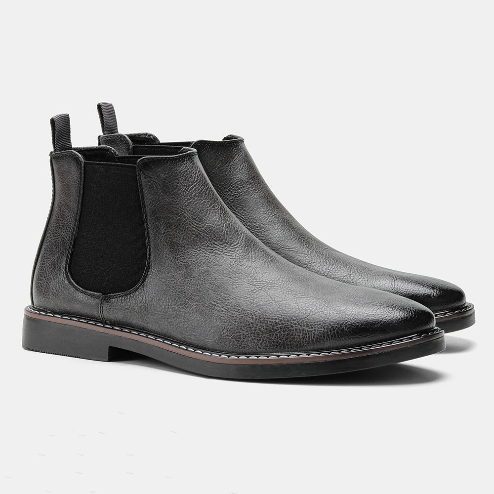 Men's black Chelsea ankle boots slip-on sleek silhouette with elastic side panels for modern style