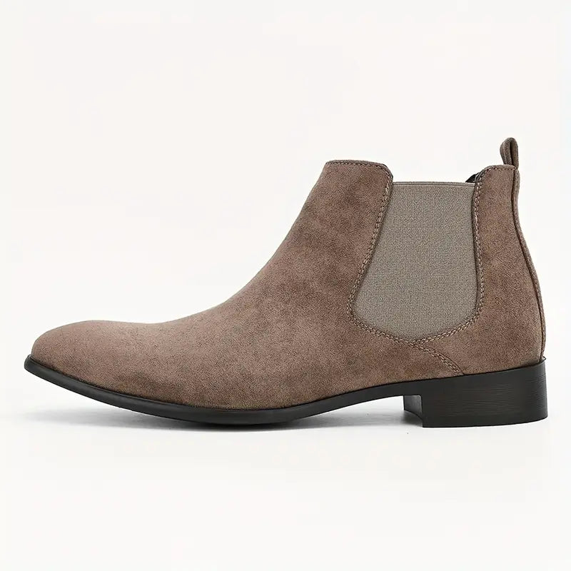 Men's black Chelsea boots sleek slip-on ankle style with elastic side panels and cushioned interior