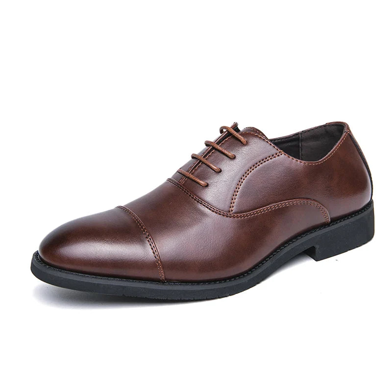Men's black cap-toe Oxford dress shoes with cushioned interior and refined lace-up silhouette