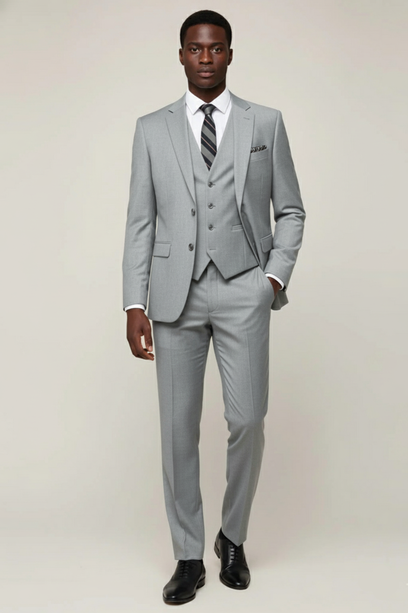 Men's classic navy three-piece tailored suit with structured blazer, waistcoat, and flat-front trousers